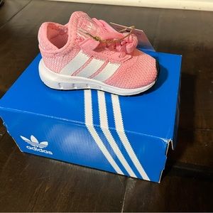 Pink adidas Swift Run shoes